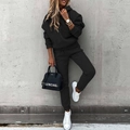 Detail of soft knit fabric texture on a black long sleeve hoodie and jogger set - S / Top And Bottom / Black