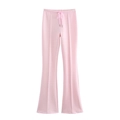 Détail du pantalon évasé rose avec taille élastique à cordon et surpiqûres verticales - Pantalon Rose