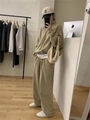 Detail of khaki oversized tracksuit featuring half-zip stand collar and wide-leg sweatpants - M / Top And Bottom / Khaki