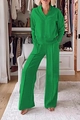 Detail of loose-fit V-neck long sleeve top and wide-leg trousers in vibrant green knit - Green