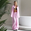 Women's pink linen two-piece set featuring a loose long-sleeve shirt and wide-leg trousers - Pink