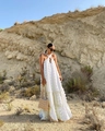 Close-up of white chiffon maxi dress featuring 3D floral accents and a halter neckline - S / Dresses / White