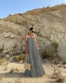 Detailed view of dark grey tiered halter maxi dress with 3D floral textures in outdoor setting - S / Dresses / Gray