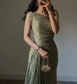 Close-up of pleated moss green evening gown with asymmetric shoulder and silk sheen fabric - S / Olive Green