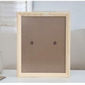 Minimalist light pine wood photo frame showing the back view and eco-friendly panel - Natural Wood Color / Large