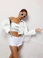 Chic white denim jacket set with fringe cuffs, tube top, and chain distressed shorts - XS / White