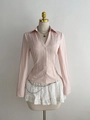 Detailed view of pale pink V-neck blouse with elegant vertical pleats and textured fabric - S / Pink