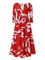 Detail of red floral maxi dress showing tied waist belt and white abstract patterns - Red Graffiti