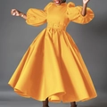 Detail of bright yellow puff sleeve midi dress with matching belt and flared hemline - S / Yellow