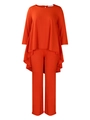 Detail view of orange two-piece set featuring asymmetrical hem and long sleeves - S / Orange