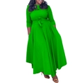 Detail of waist tie bow and smooth vibrant green fabric on long sleeve maxi dress - Green