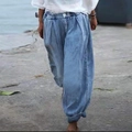 Pantaloni denim stile harem da donna in blu chiaro lavato con vita elastica e taglio ampio - 3XL / Blu