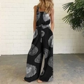Detail showing the square neck design and side pockets of the polka dot print jumpsuit - Black Circles