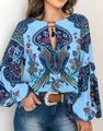 Detail of bohemian shirt featuring parrot and floral prints with tassel neck ties - S / Blue