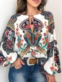 Detail of bohemian floral print blouse featuring tassel ties and colorful parrot motifs - S / White