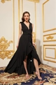 Detail of high-low ruffled hemline and waist tie on an elegant black V-neck evening dress - S / Black