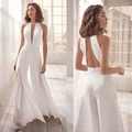 Elegante witte halter jumpsuit met diepe V-hals en kanten details voor dames - S / Wit