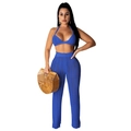 Detail of royal blue crochet two-piece set featuring knit hollow patterns and high waist pants - Blue