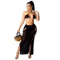 Detail of black crochet two-piece set featuring cutout knit top and high-waist long skirt - Black
