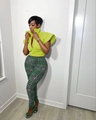 Detail of neon green mock neck top with cap sleeves and plaid leggings set - Fruit Green