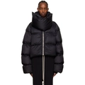 Detail of oversized black puffer jacket featuring exaggerated high funnel neck and metal zipper - S / Black