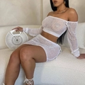 Detail of white crochet beach set showing intricate hollow knit texture and side tie design - White
