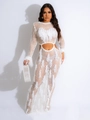 Witte gehaakte maxi-jurk met franjes en opengewerkte details voor een elegante strandlook - S / Wit