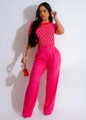 Detalle del top de punto con estampado de corazones y pantalón rosa de pernera ancha - S / Rojo