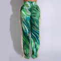 Green high-waisted trousers with abstract print and long fringe trim on side seams - Green