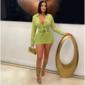 Set in maglia verde erba con top a maniche lunghe traforato e minigonna sexy coordinata - S / verde chiaro