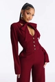 Detail of burgundy pinstripe jumpsuit featuring a large bow tie and amber buttons - S / Burgundy