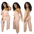 Detail of pink one-shoulder wide-leg jumpsuit with a waist bow tie and hollow sleeve - Pink