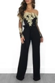 Detail van goud bloemenborduurwerk op zwarte mesh mouwen en off-shoulder jumpsuit - S / Geborduurde Strapless Jumpsuit / Zwart Gouden Rand