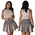 Completo due pezzi in maglia da donna con top senza maniche e motivo a greca - S / Albicocca
