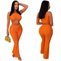 Oranje gebreide set met mouwloze crop top en broek met opengewerkte details - S / Oranjerood
