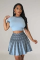 Dettaglio del set in maglia azzurra con motivi a meandro neri su colletto e vita - S / Azzurro
