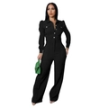 Detailed view of women's black long-sleeve jumpsuit featuring lapels and chest pockets - S / Black