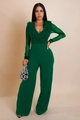 Detail van donkergroene jumpsuit met transparante mouwen en V-hals met ruches op top - S / Groen