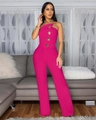 Dettaglio della tuta fucsia monospalla con bottoni dorati decorativi sul petto - S / Rosa Rosso