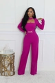 Detail of fuchsia long sleeve jumpsuit with cutout neckline and gold chain belt - S / Rose Red