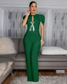 Close-up of teardrop cutout neckline and silver rhinestone bow on dark green jumpsuit - Green