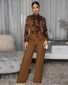 Detail of elegant leopard print shirt with bow tie and brown wide leg trousers - S / Brown