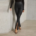 Pantaloni in ecopelle nera a vita alta, modello a zampa con spacco frontale elasticizzati - S / Nero