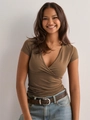 Close-up detail of walnut brown wrap V-neck T-shirt with slim fit knitted texture - S / Dark Brown