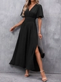 Detail view of elegant black V-neck dress with ruffle cap sleeves and high leg split - S / Black
