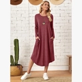 Dettaglio vestito bordeaux a maniche lunghe con tasche laterali e orlo curvo - S / Borgogna