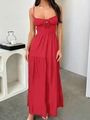 Detail showing the pleated neckline and tie-knot on the red backless tiered maxi dress - S / Red