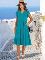 Dettaglio dell'abito midi a balze verde acqua con scollo a V e tasche laterali - Blu-Verde
