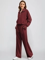Close-up of burgundy half-zip sweatshirt and matching wide-leg pants fabric texture - S / Red