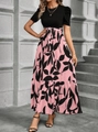 Detail of elegant black bodice and pink floral leaf print skirt with waist tie belt - S / Pink